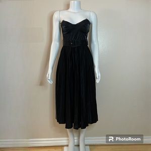 Black strapless belted pleated midi dress with lace details